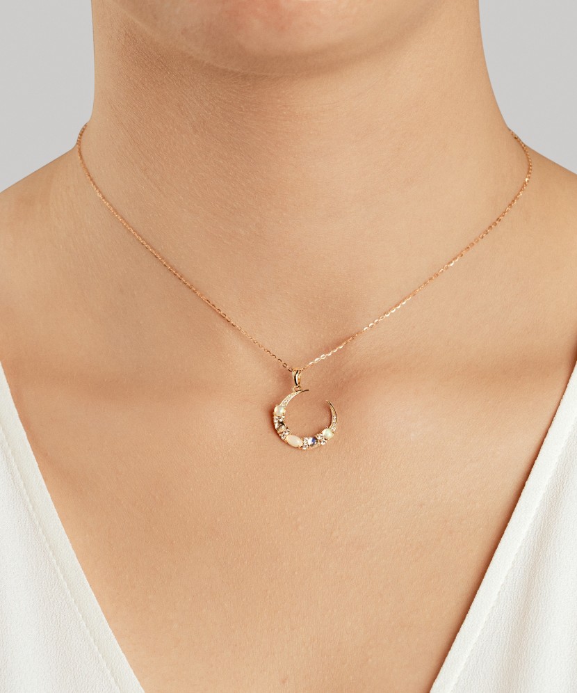 Geltono aukso pakabukas su deimantais, opalais ir topazais