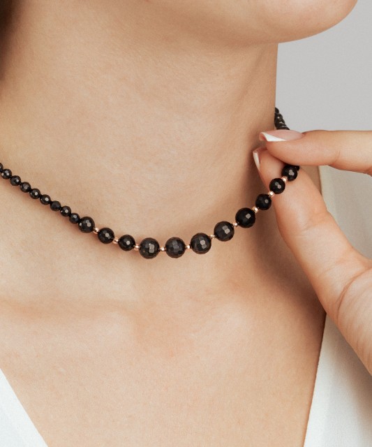 Vėrinys su oniksais ir auksu