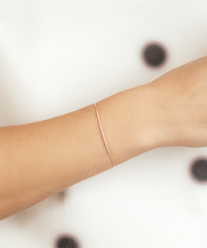 Auksinė apyrankė su deimantais