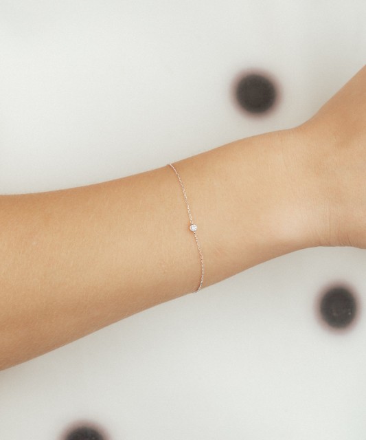 Balto aukso apyrankė su deimantais