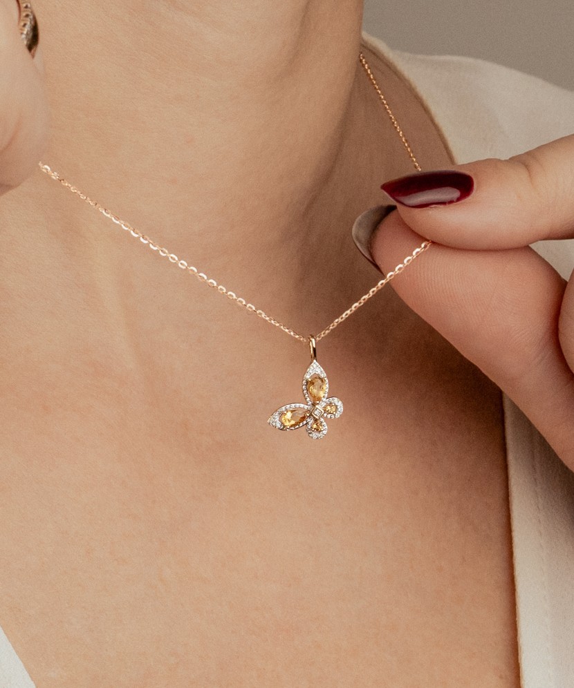 Geltono aukso pakabukas su deimantais ir citrinais