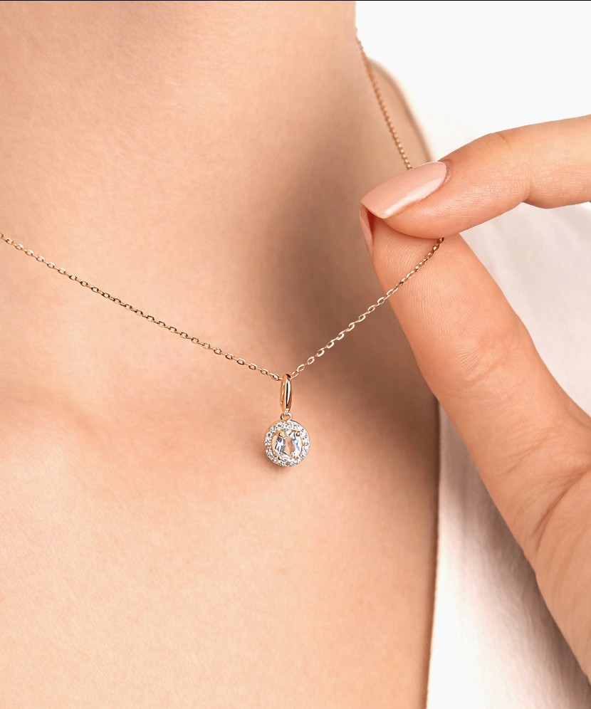 Auksinis pakabukas su baltuoju topazu ir deimantais