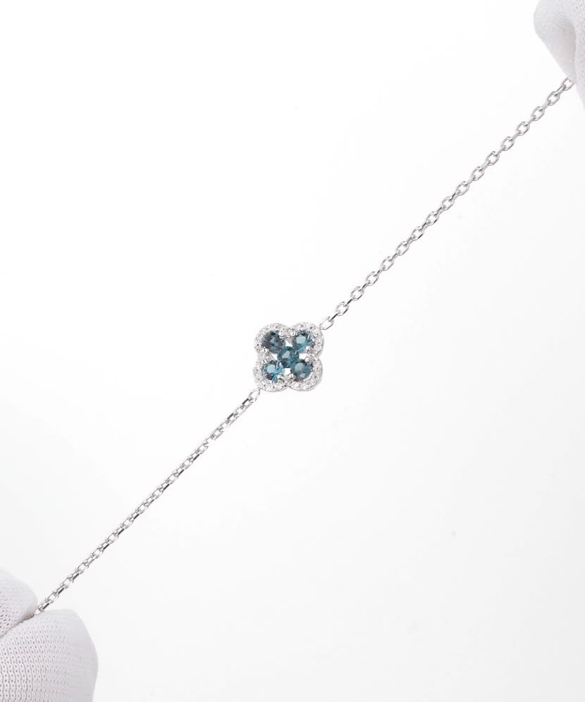 Balto aukso apyrankė su deimantais ir London topazu