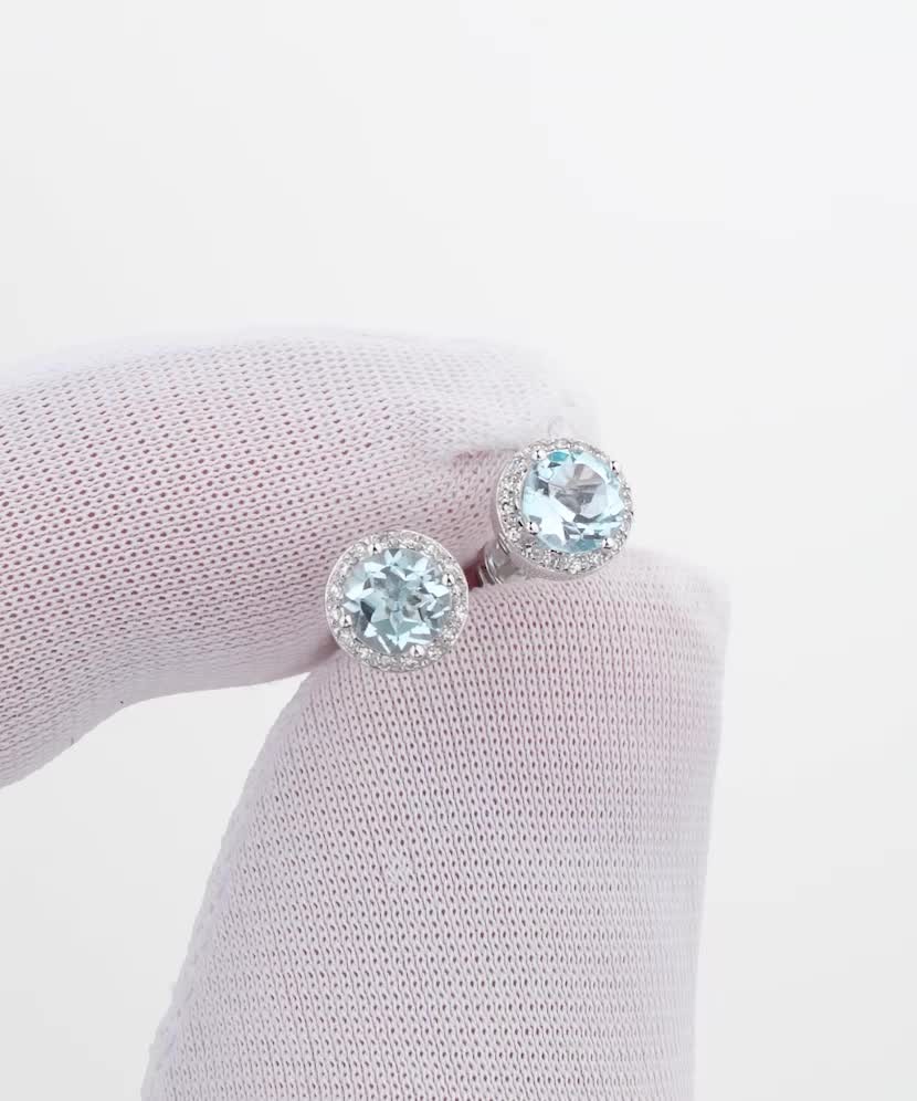 Balto aukso auskarai su topazais ir deimantais