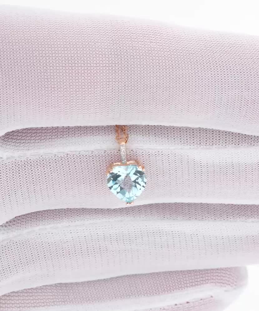 Auksinis pakabukas su deimantais ir topazu