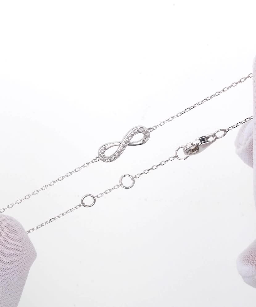 Balto aukso apyrankė su deimantais "Begalybė"