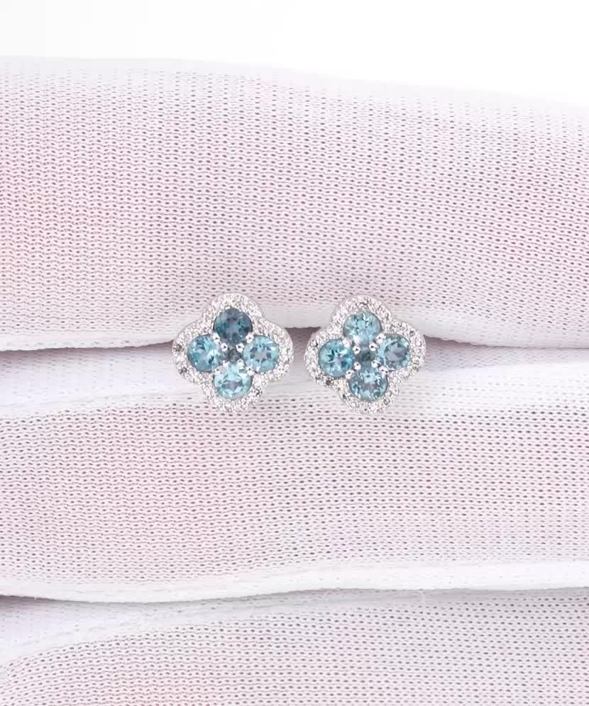 Balto aukso auskarai su topazais ir deimantais