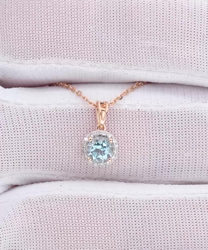 Auksinis pakabukas su topazu ir deimantais